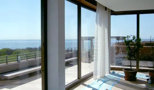 Hurricane-Resistant Windows and Doors: Engineering Performance and Architectural Design